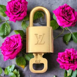 Louis Vuitton #319 Lock and Key. Brass Goldtone Authentic Qty. 1 w Chain
